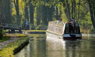 Canal boat going through a lock